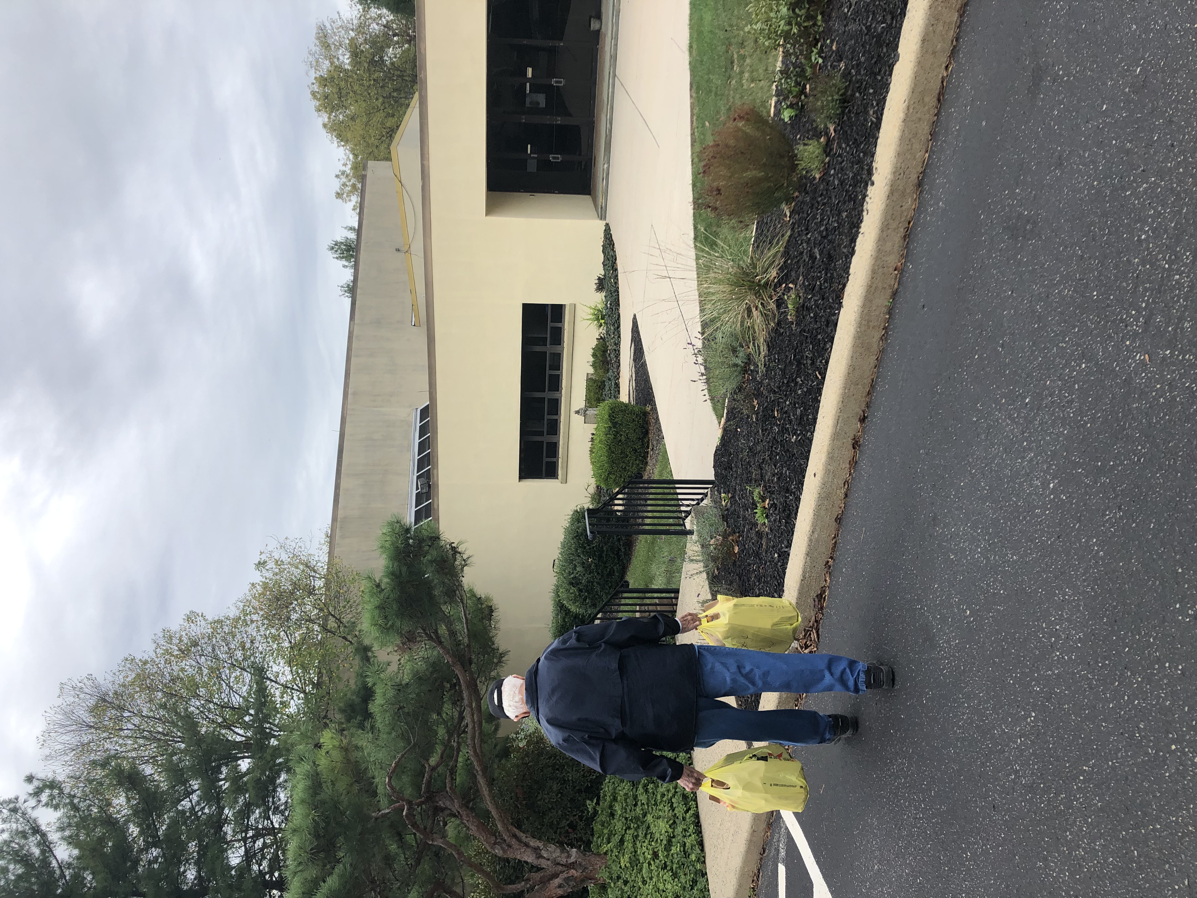 Tom Jeffas carrying food bags